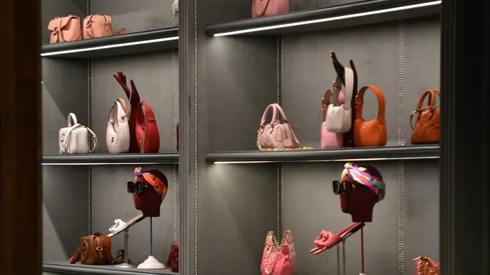 Couple dining on a luxury balcony with a view of the Eiffel Tower at night