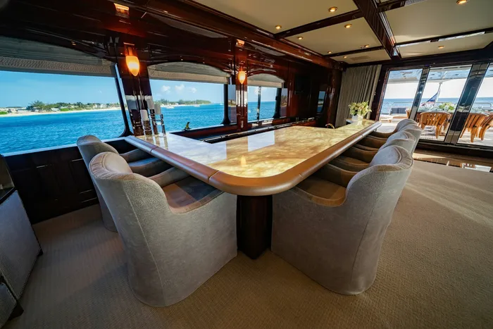 Couple dining on a luxury balcony with a view of the Eiffel Tower at night